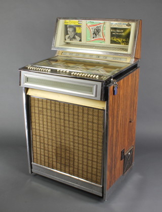 A 1960's Jupiter Electro-Kicker E80 Juke Box with chromium mounts, numbered 59548 50"h x 27"w x 22 1/2d" 