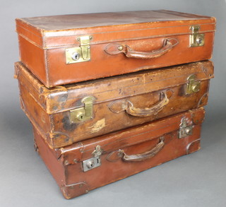 2 leather suitcases with brass mounts 7" x 26"w x 16"d, 6"h x 25 1/2"w x 13"d and 1 other with chrome locks 7 1/2" x 36"w x 14"d 