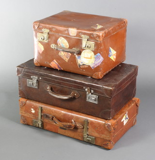 A Parsons fibre case with chrome mounts bearing numerous labels 11"h x 18"w x 14"d, a Revelation brown leather case with chrome mounts 7"h x 26"w x 16" and 1 other leather case with chrome mounts 8" x 26" x 15 1/2"