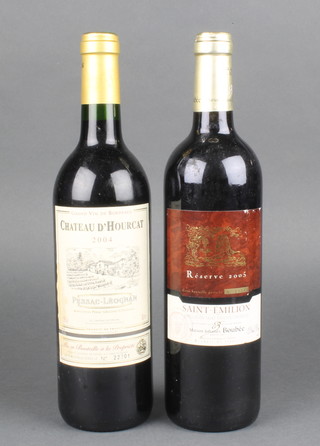 A bottle of 2004 Chateau D'Hourcat Pessac-Leognan and  a bottle of 2005 Reserve St Emilion