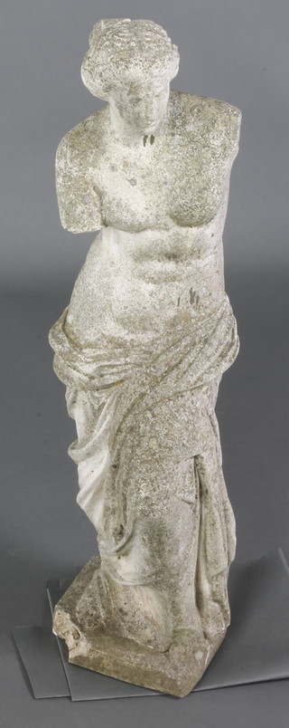 A well weathered composition stone figure of a standing Venus De Milo 34"h
 