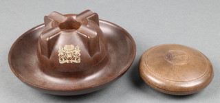 A circular Art Deco brown Bakelite ashtray of dome form decorated the badge of the Westminster Dragoons and the Royal Tank Corps 6" together with a brown Parker Baccyflap cylindrical tobacco box and cover 3 1/2" 