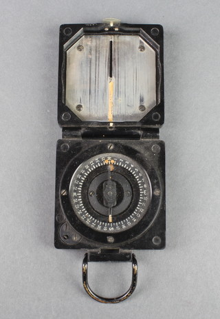 A Military Issue marching compass Mk 1, the reverse marked B150053 TG & Co Ltd