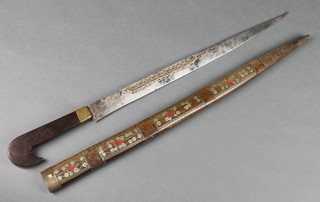 An Indian Kard dagger with 15 1/2" inlaid blade contained in an inlaid scabbard (cracked) 