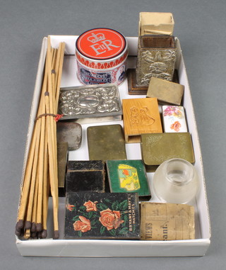 An embossed silver plated match box, a travelling vesta case and a collection of various match slips etc 