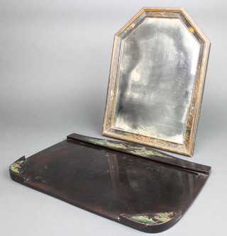 A 1920's arch shaped bevelled plate easel mirror contained in a black lacquered chinoiserie style frame 16" x 12" together with a ditto shaped blotter 