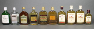 A 35cl bottle of Gordons Gin, 4 35cl bottles of brandy (2 Napoleon 1 label missing, Three Barrels and Waitrose 3 year old French brandy), a 35cl bottle of Waitrose vodka, 2 35cl bottles of Famous Grouse whisky, ditto Bells whisky and a 20cl bottle of Bells whisky

