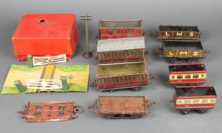 A Hornby O gauge level crossing (f) and a collection of various Hornby rolling stock 