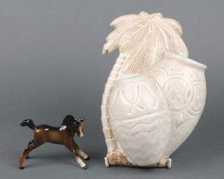 A Beswick wall pocket in the form of 2 vases beneath a palm tree 1063 9" and a ditto figure of a standing foal 3" 