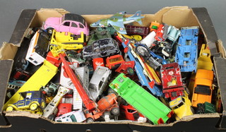 A collection of Dinky and other toy cars, all play worn