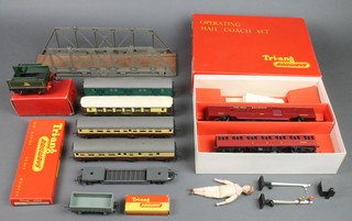 A Triang R.119 operating TC mail coach set comprising 2 carriages, boxed, a Hornby O gauge no.51 tender boxed, 4 carriages, 2 signals etc 