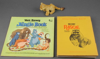A felt figure of a seated lion 4"  7 editions about Walt Disney's production "Rascal" 1969, a 33rpm recording of Walt Disney's The Jungle Book St3948