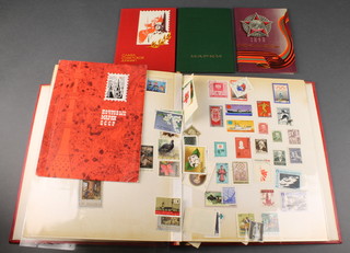 4 small albums of Soviet stamps and a collection of used world stamps