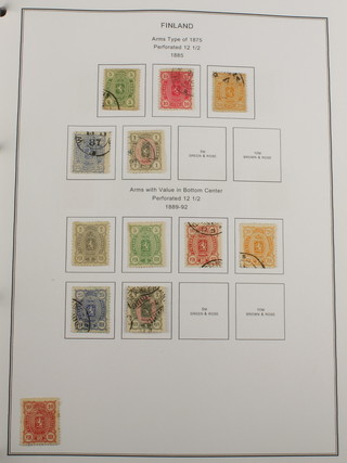 A quantity of mint and used stamps Finland 1859-2005 and an album of Lichtenstein stamps 1912-1997 