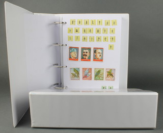 2 ring binders of various mint and used world stamps A-Z