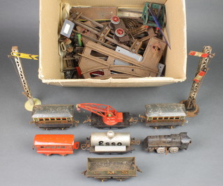 A quantity of various O gauge rails and rolling stock etc, play worn 
