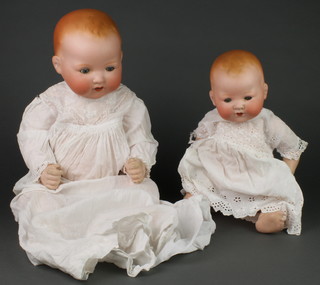 Armand Marseille, a 19th Century porcelain headed doll with open and closing eyes, 2 teeth, head incised AM German 351/RK with articulated body together with 1 other Armand Marseille porcelain headed doll with open and closing eyes and 2 teeth, head incised AM Germany 351/4K 