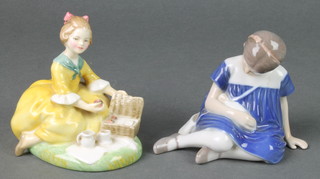 A Bing and Grundle figure of a seated girl with doll 1526 4", a Royal Doulton figure - Picnic HN2308 4"