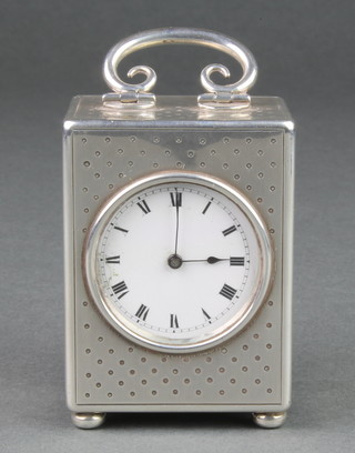 An early 20th Century Continental silver engine turned bedroom timepiece 3 1/2" to handle 