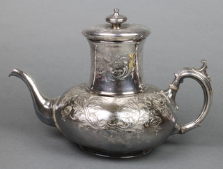 A silver plated chased tea kettle 