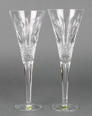 A pair of Waterford crystal champagne flutes 9", boxed
