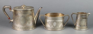 An Edwardian silver plated 3 piece tea set with chased floral decoration 