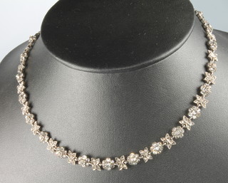 A Victorian silver paste set flower head necklace 15"