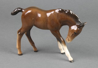 A Beswick figure of a standing foal 4 1/2" 
