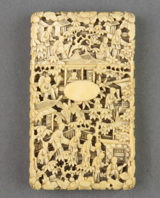 A Cantonese carved ivory card case depicting figures and pavilions in gardens 3 3/4" x 2 1/4"