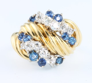 A vintage yellow gold sapphire and diamond ring with adjustable mount, starting size M