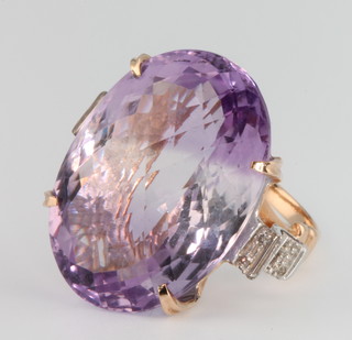 A yellow gold amethyst and diamond dress ring, size M 1/2