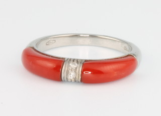 An 18ct white gold coral and diamond dress ring, size O