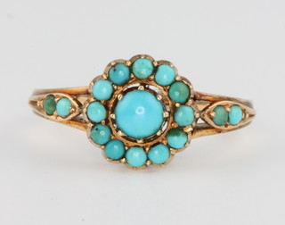 A yellow gold turquoise cluster ring, size N 