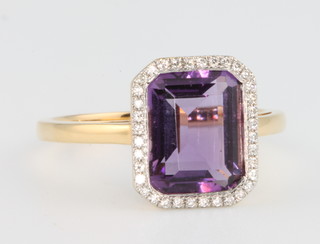 An 18ct yellow gold amethyst and diamond dress ring size M 1/2 