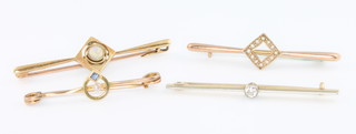 An Edwardian 15ct gold opal bar brooch and 3 others
