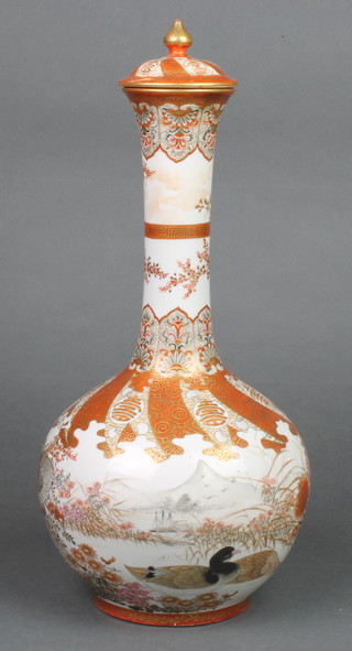 A Japanese Kutani baluster vase with elongated neck and lid decorated with exotic birds amongst flowers 14 1/2" 