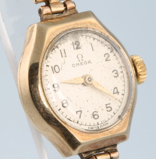 A lady's 9ct yellow gold Omega wristwatch on an expanding bracelet