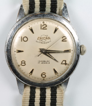 A gentleman's chrome cased Enicar Ultrasonic wristwatch on a cloth strap