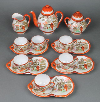 A Japanese egg shell porcelain part tea set comprising teapot, lidded sugar bowl, milk jug, 6 cups and 5 double saucers 