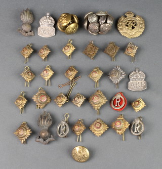 A WWII silver ARP badge and minor cap badges and buttons