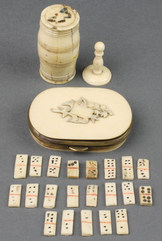 An Edwardian carved ivory purse decorated with flowers 2" and a turned bone barrel containing miniature dominoes and a chess pawn 1" 
