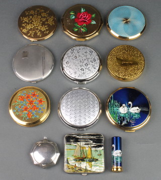 A silver engine turned compact, an octagonal ditto and a collection of decorative compacts 