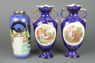 A 1930's cylindrical Royal Crown Devon vase decorated a romantic garden scene 9" together with a pair of Edwardian twin handled pottery vases 10" 