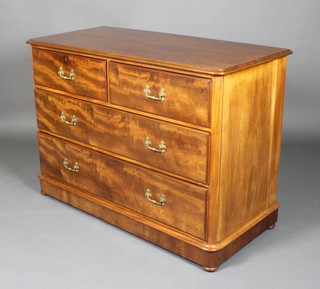 A Victorian D shaped chest of 2 short and 2 long drawers with brass swan neck drop handles and escutcheons, raised on a platform base 36"h x 50"w x 23"d 