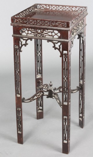 A 19th Century Chippendale style urn table with fret work decoration and X framed stretcher 29"h x 12"w x 12"d 