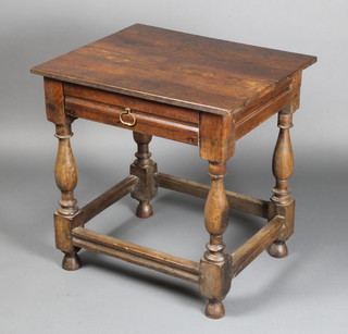 A 17th Century style oak side table fitted a drawer, raised on turned supports with box framed stretcher 27"h x 26"w x 22"d 