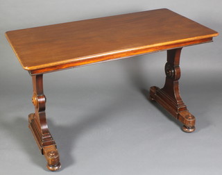A Victorian rectangular mahogany centre table raised on trestle supports 29"h x 48"w x 25 1/2"d 