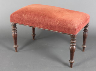 A Victorian rectangular mahogany stool with red upholstered seat on turned supports 17"h x 28"w x 17"d 