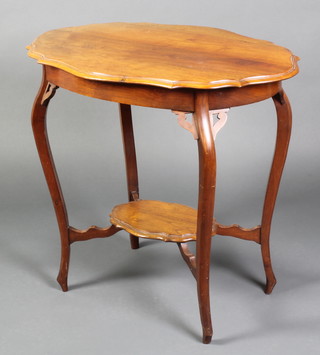 An Edwardian oval walnut 2 tier occasional table with undertier, raised on cabriole supports 27"h x 31"w x 21"d 