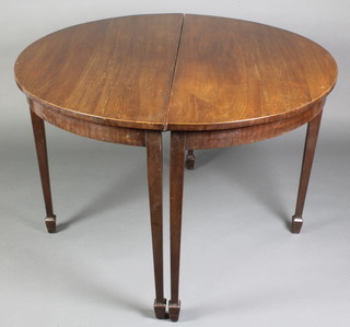 A 19th Century mahogany D end dining table with 1 extra leaf, raised on 6 square tapering supports, spade feet, 29 1/2"h x 47"w x 46"l x 65 1/2" with extra leaf 
